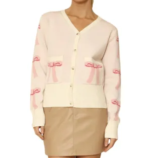 Cropped Knit Bow Cardigan With Pockets In Pink Multi