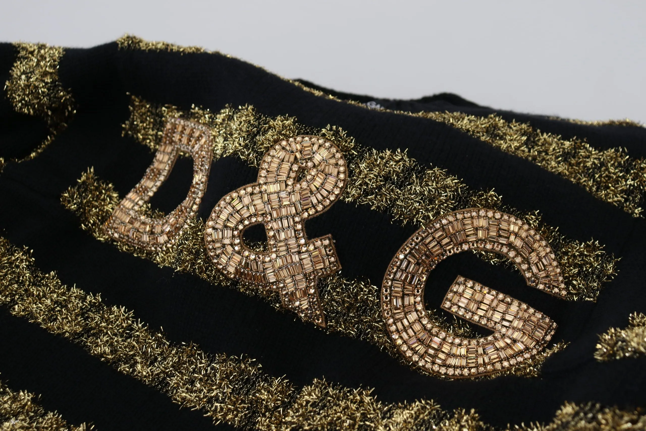 Dolce & Gabbana Elegant and gold Crystal Women's Sweater