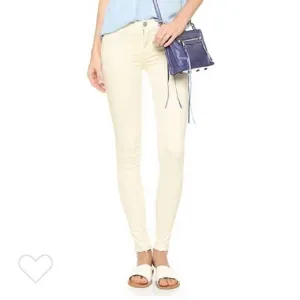 Nico Mellow Mid Rise Super Skinny Stretch Skinny Jeans In Light Yellow