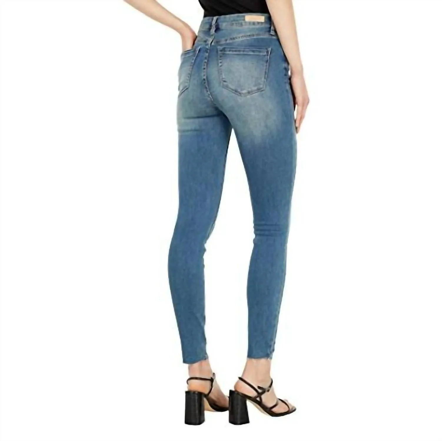 The Great Jones High Rise Raw Hem Jean In Blue